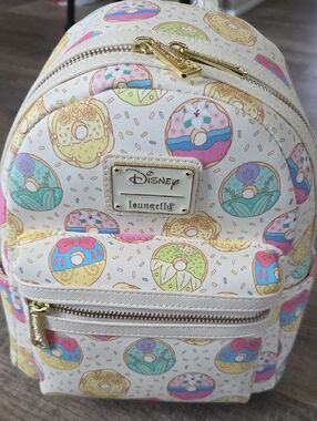 Disney Loungefly Cream Donut P Mini Backpack with Gold Hardware